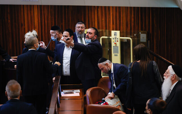 Members of the opposition argue during a discussion on a law regarding unemployment payouts during a plenum session in the Knesset in Jerusalem on July 1, 2021. (Yonatan Sindel/FLASH90) Members of the opposition argue during a discussion on a law regarding unemployment payouts during a plenum session in the Knesset in Jerusalem on July 1, 2021. (Yonatan Sindel/FLASH90)