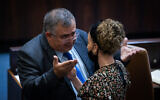 Likud MK David Bitan (L) speaks with coalition whip Idit Silman (Yamina) during a Knesset plenum session in Jerusalem, on July 6, 2021. (Yonatan Sindel/Flash90)