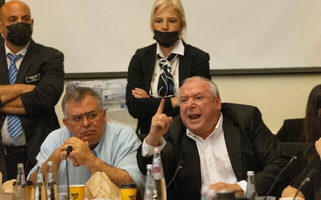 MKs David Amsalem and David Bitan of Likud at the Arrangements Committee meeting at the Knesset in Jerusalem, on July 5, 2021 (Yonatan Sindel/Flash90) MKs David Amsalem and David Bitan of Likud at the Arrangements Committee meeting at the Knesset in Jerusalem, on July 5, 2021 (Yonatan Sindel/Flash90)