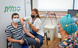 An Israeli youth receives the coronavirus vaccine in Petah Tikva, on July 19, 2021. (Flash90)