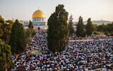 Thousands of Palestinians attend prayers at the Al Aqsa Mosque, in Jerusalem, marking the Muslim holiday of Eid al-Adha, July 20, 2021. (Jamal Awad/Flash90)