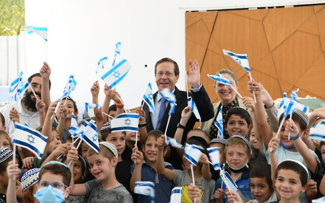 President Isaac Herzog during a visit to Lod on July 15, 2021. (Amos Ben-Gershom/GPO) President Isaac Herzog during a visit to Lod on July 15, 2021. (Amos Ben-Gershom/GPO)