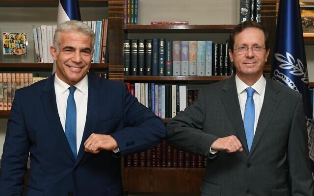 President Isaac Herzog (R) and Foreign Minister Yair Lapid at the President's Residence in Jerusalem on July 18, 2021. (Mark Neyman/GPO) President Isaac Herzog (R) and Foreign Minister Yair Lapid at the President's Residence in Jerusalem on July 18, 2021. (Mark Neyman/GPO)