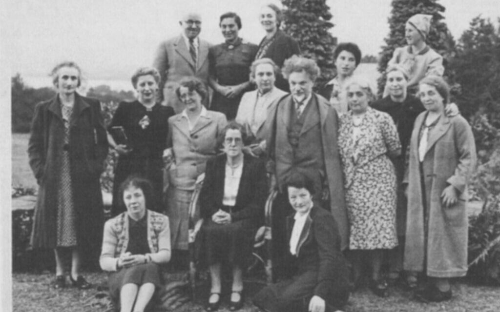 Lake District 1941: Standing behind violinist Dr. Oskar Adler, Hella Pick is the youngest in a group of refugees. (Courtesy)