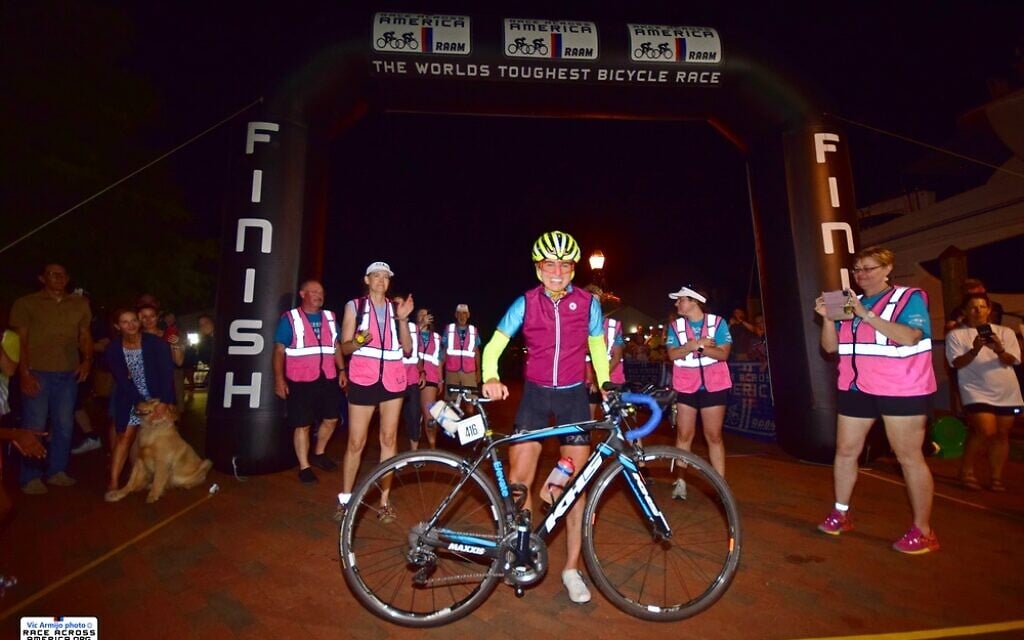 Leah Goldstein at the Race Across America 2021 finish line. She is the first female to win the overall solo division in the 39-year history of RAAM, finishing the course in 11 days, 3 hours and 30 minutes (Vic Armijo/RAAM Media)