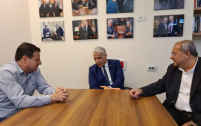 File: Yesh Atid leader Yair Lapid meets (center) with Joint List leaders Ayman Odeh (left) and Ahmad Tibi in the Knesset on April 19, 2021. (Courtesy)