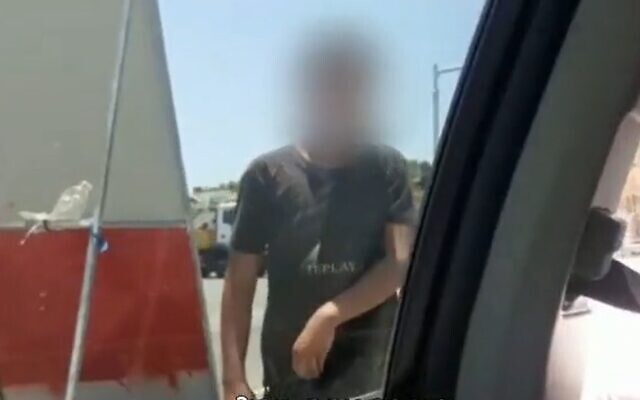 A Palestinian boy begging for alms at a junction in northern Israel, July 2021. (Screenshot: Channel 12) A Palestinian boy begging for alms at a junction in northern Israel, July 2021. (Screenshot: Channel 12)