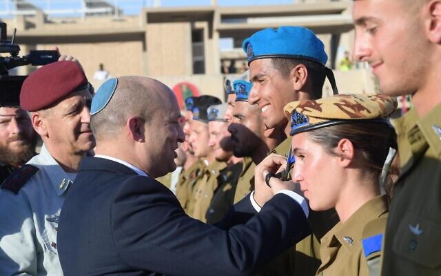 Prime Minister Naftali Bennett at a ceremony marking the completion of an IDF officers training course on July 1, 2021. (Amos Ben Gershom/GPO) Prime Minister Naftali Bennett at a ceremony marking the completion of an IDF officers training course on July 1, 2021. (Amos Ben Gershom/GPO)