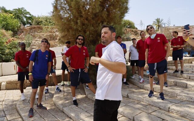 Retired players from Spanish soccer league rivals FC Barcelona and Real Madrid CF toured the ancient port city of Jaffa on July 20, 2021, ahead of the planned exhibition match at Jaffa's Bloomfield Stadium. (Courtesy: Guy Yechiely)