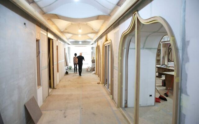 NaTang, left, and Jeffrey D. Schwartz in Taiwan's new Jewish community center, currently under construction. (Glenn Leibowitz)