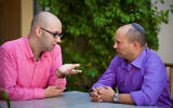 Political adviser Moshe Klughaft (L) with then-Jewish Home leader Naftali Bennett in 2013 (Eric Sultan/Klughaft.com)