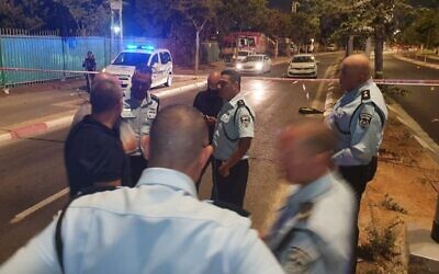 Police at the scene of a suspected mob killing in Tel Aviv on July 17, 2021. (Israel Police)