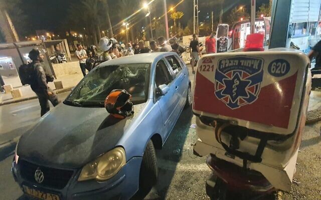 A car belonging to an Israeli family that was hit by rocks thrown by Palestinians near Damascus Gate, in Jerusalem, July 18, 2021. (United Hatzalah) A car belonging to an Israeli family that was hit by rocks thrown by Palestinians near Damascus Gate, in Jerusalem, July 18, 2021. (United Hatzalah)
