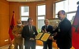 Yigal Unna, the director general of the Israel National Cyber Directorate, right to left, Morocco's defense minister Abdellatif Loudiyi  and Unna's Moroccan counterpart General El Mostafa Rabii, sign a cybersecurity cooperation accord in Rabat, Morocco; July 2021 (Courtesy)
