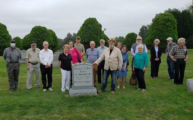 At the unveiling of gravestone for Thomas LaRue Jones aka 'The Black Cantor' at Rosehill Cemetery in Linden, New Jersey, on August 29, 2021. Henry Sapoznik (in hat) is at center with hand on the monument. (David Sperling)