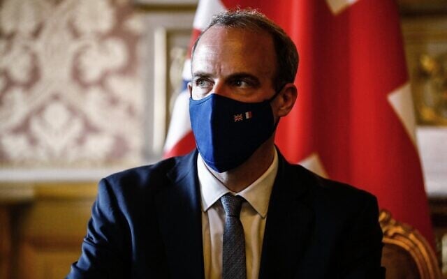 Britain's Foreign Secretary Dominic Raab looks on before signing an agreement with his French counterpart (not seen) in Paris on July 26, 2021. (Sameer Al-Doumy/AFP) Britain's Foreign Secretary Dominic Raab looks on before signing an agreement with his French counterpart (not seen) in Paris on July 26, 2021. (Sameer Al-Doumy/AFP)