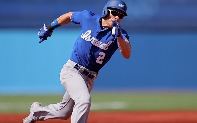 Israel's Blake Gailen runs towards the home plate to score during the seventh inning of the Tokyo 2020 Olympic Games baseball round 1 game between Israel and Mexico at Yokohama Baseball Stadium in Yokohama, Japan, on August 1, 2021. (KAZUHIRO FUJIHARA / AFP) Israel's Blake Gailen runs towards the home plate to score during the seventh inning of the Tokyo 2020 Olympic Games baseball round 1 game between Israel and Mexico at Yokohama Baseball Stadium in Yokohama, Japan, on August 1, 2021. (KAZUHIRO FUJIHARA / AFP)