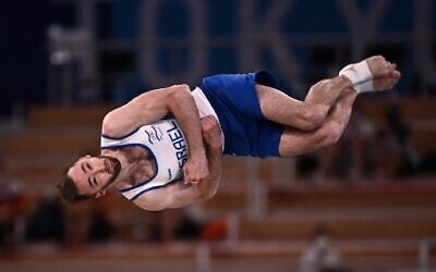 Israel's Artem Dolgopyat competes in the artistic gymnastics men's floor exercise final during the Tokyo 2020 Olympic Games at the Ariake Gymnastics Centre in Tokyo on August 1, 2021. (Lionel BONAVENTURE / AFP)