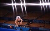 Israel's Artem Dolgopyat competes in the floor event of the artistic gymnastics men's floor exercise final during the Tokyo 2020 Olympic Games at the Ariake Gymnastics Centre in Tokyo on August 1, 2021. (Loic VENANCE / AFP)