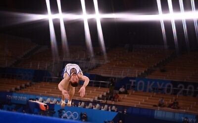 Israel's Artem Dolgopyat competes in the floor event of the artistic gymnastics men's floor exercise final during the Tokyo 2020 Olympic Games at the Ariake Gymnastics Centre in Tokyo on August 1, 2021. (Loic VENANCE / AFP)