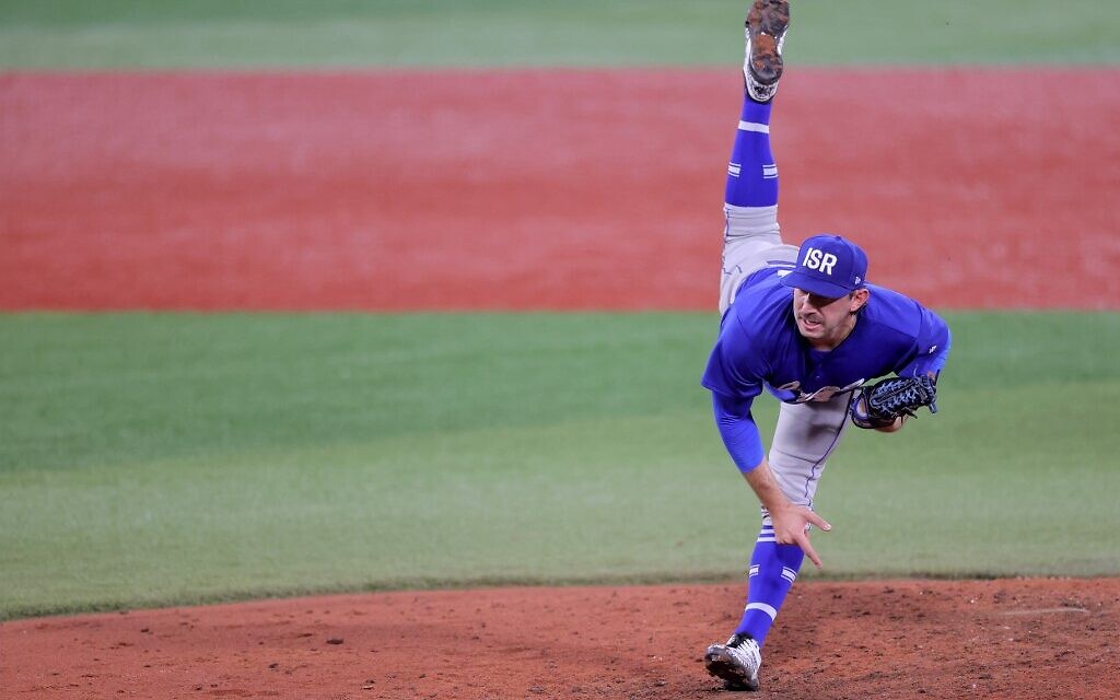 Israel's relief pitcher Zachary Weiss hurls the ball during the eighth inning of the Tokyo 2020 Olympic Games baseball round 1 repechage game between Israel and Dominican Republic at Yokohama Baseball Stadium in Yokohama, Japan, on August 3, 2021. (KAZUHIRO FUJIHARA / AFP)