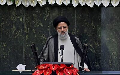 Iran's newly elected President Ebrahim Raisi speaks at his swearing in ceremony at the Iranian parliament in the capital Tehran, on August 5, 2021. (Photo by Atta Kenare/AFP)