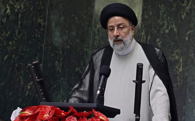 Iran's new President Ebrahim Raisi speaks during his swearing in ceremony at the Iranian parliament in the capital Tehran, on August 5, 2021. (Atta Kenare/AFP) Iran's new President Ebrahim Raisi speaks during his swearing in ceremony at the Iranian parliament in the capital Tehran, on August 5, 2021. (Atta Kenare/AFP)