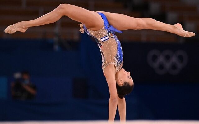 Israel's Linoy Ashram competes in the individual all-around final of the Rhythmic Gymnastics event during Tokyo 2020 Olympic Games at Ariake Gymnastics centre in Tokyo, on August 7, 2021. (Martin BUREAU / AFP)