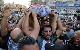 Palestinians carry the body of Dia al-Sabarini, 25, during his funeral in the West Bank city of Nablus on August 11, 2021. (JAAFAR ASHTIYEH / AFP)