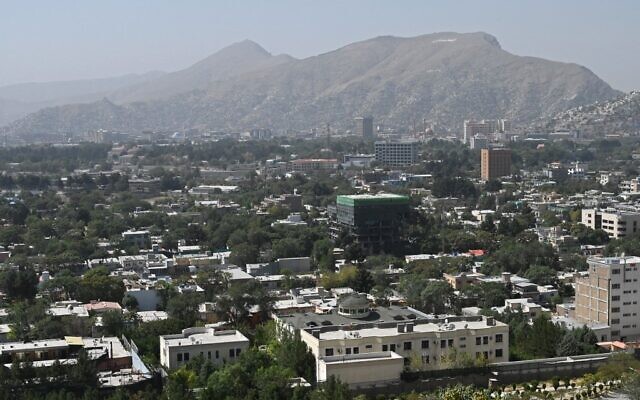 This picture taken from the top of a hillside shows a general view of the Kabul city on August 15, 2021. (Wakil KOHSAR / AFP)