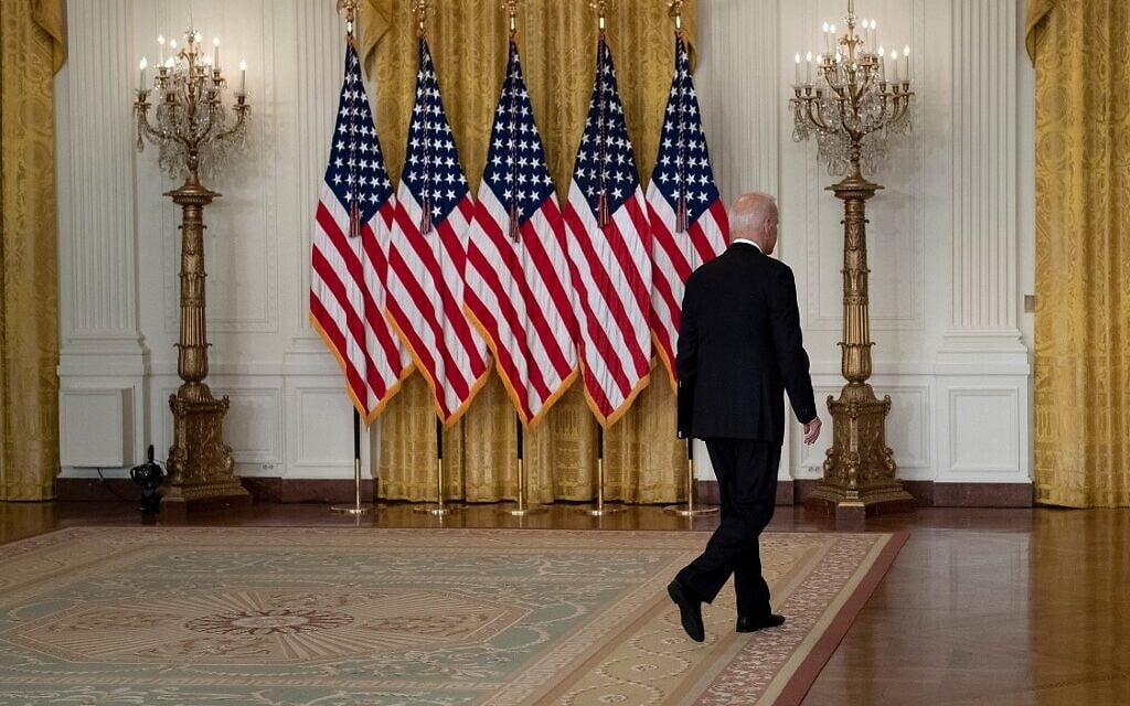 US President Joe Biden leaves after speaking about the Taliban's takeover of Afghanistan, from the East Room of the White House, on August 16, 2021, in Washington, DC. (Brendan Smialowski/AFP) US President Joe Biden leaves after speaking about the Taliban's takeover of Afghanistan, from the East Room of the White House, on August 16, 2021, in Washington, DC. (Brendan Smialowski/AFP)