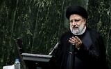 Iran's President Ebrahim Raisi speaks before parliament to defend his cabinet selection, in the capital Tehran, on August 21, 2021. (Atta Kenare/AFP)