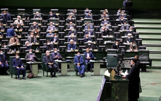 Iranian President Ebrahim Raisi speaks before parliament in the capital Tehran on August 21, 2021. (Atta Kenare/AFP)