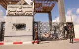 Members of Palestinan security forces stand guard at the closed off Rafah border crossing to Egypt in the southern Gaza Strip, on August 23, 2021 (Said Khatib/AFP)