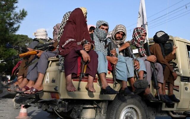 Taliban fighters in a vehicle patrol the streets of Kabul on August 23, 2021 (Wakil KOHSAR / AFP) Taliban fighters in a vehicle patrol the streets of Kabul on August 23, 2021 (Wakil KOHSAR / AFP)