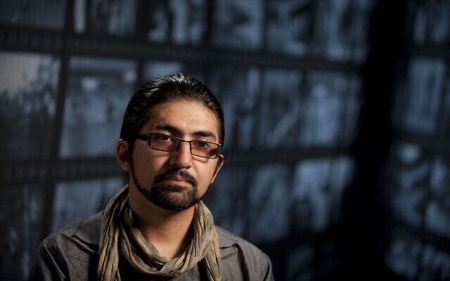 In this file photo taken on May 24, 2012, photographer Massoud Hossaini speaks during a discussion of his Pulitzer Prize winning photograph at the Newseum in Washington. (Saul Loeb/AFP) In this file photo taken on May 24, 2012, photographer Massoud Hossaini speaks during a discussion of his Pulitzer Prize winning photograph at the Newseum in Washington. (Saul Loeb/AFP)