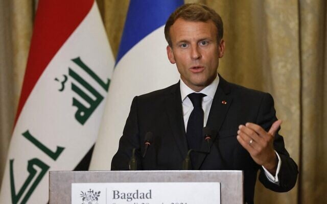 French President Emmanuel Macron holds a press conference at the guest house in the Iraqi capital Baghdad, on August 28, 2021. (Ludovic Marin/AFP) French President Emmanuel Macron holds a press conference at the guest house in the Iraqi capital Baghdad, on August 28, 2021. (Ludovic Marin/AFP)