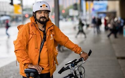 Sayed Sadaat, former communications minister in Afghanistan, poses for a photo in Leipzig, eastern Germany on August 29, 2021. (JENS SCHLUETER / AFP)