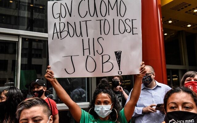 People participate in a protest against NY Governor Andrew Cuomo and protest for a moratorium on evictions on August 4, 2021 in New York City. (Stephanie Keith/Getty Images/AFP) People participate in a protest against NY Governor Andrew Cuomo and protest for a moratorium on evictions on August 4, 2021 in New York City. (Stephanie Keith/Getty Images/AFP)