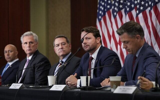 (L-R) Rep. Brian Mast (R-FL), House Minority Leader Kevin McCarthy (R-CA), Rep. Mark Green (R-TN) Rep. Dan Crenshaw (R-TX) and Rep. Jim Banks (R-IN) listen during a meeting with House Republicans, including those who served in the military, about the American military withdrawal in Afghanistan at the U.S. Capitol on August 30, 2021 in Washington, DC. (Drew Angerer / GETTY IMAGES NORTH AMERICA / Getty Images via AFP) (L-R) Rep. Brian Mast (R-FL), House Minority Leader Kevin McCarthy (R-CA), Rep. Mark Green (R-TN) Rep. Dan Crenshaw (R-TX) and Rep. Jim Banks (R-IN) listen during a meeting with House Republicans, including those who served in the military, about the American military withdrawal in Afghanistan at the U.S. Capitol on August 30, 2021 in Washington, DC. (Drew Angerer / GETTY IMAGES NORTH AMERICA / Getty Images via AFP)
