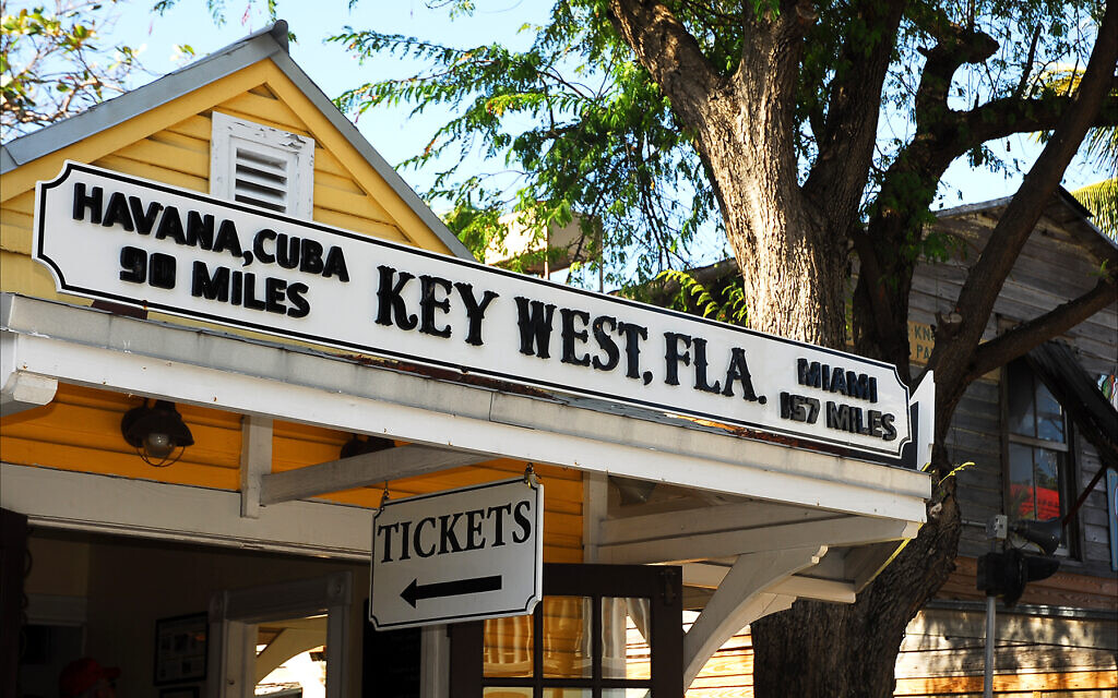 Key West, Florida, is much closer to Havana, Cuba, than to Miami, as is apparent on this storefront in Mallory Square. (Larry Luxner/via JTA)