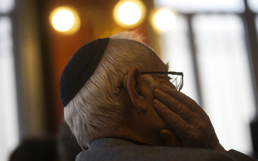 Illustrative: A man wearing a kippah listens during a news conference at the Royal Spanish Academy in Madrid, February 20, 2018. (AP Photo/Francisco Seco)