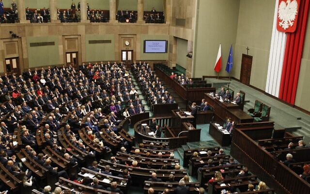 File: The lower hose of Poland's parliament, or Sejm, filled with new lawmakers, and foreign diplomats as guests, during the gala inauguration of a new four-year term of the national parliamentin Warsaw, Poland, Tuesday, Nov. 12, 2019. (AP Photo/Czarek Sokolowski)