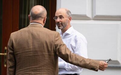 Rob Malley, US special envoy for Iran (R) and Stephan Klement, EU ambassador and European external action service special advisor on Iran, talk in front of the Hotel Imperial near the Grand Hotel Vienna where closed-door nuclear talks took place in Vienna, Austria, June 20, 2021. (AP Photo/Florian Schroetter)
