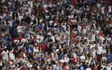 England fans cheer during the Euro 2020 final soccer match between Italy and England at Wembley stadium in London, July 11, 2021. (Facundo Arrizabalaga/Pool via AP)