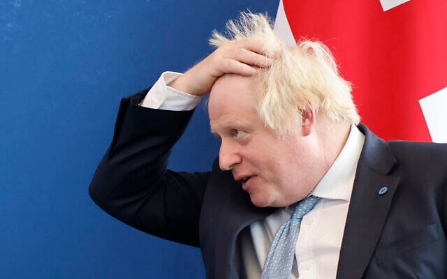 Britain's Prime Minister Boris Johnson attends a London-based summit to raise funds for the Global Partnership for Education (GPE), July 29, 2021. (Tolga Akmen/Pool via AP) Britain's Prime Minister Boris Johnson attends a London-based summit to raise funds for the Global Partnership for Education (GPE), July 29, 2021. (Tolga Akmen/Pool via AP)