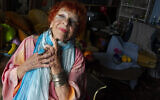 Artist and performer Ilona Royce Smithkin poses in her house in Provincetown, Massachusetts, July 20, 2012. (AP Photo/Virginia Mayo)