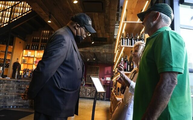 Security personnel ask customers for proof of vaccination as they enter City Winery, June 24, 2021, in New York. (AP Photo/Frank Franklin II, File)