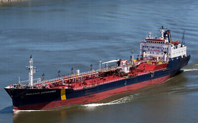 In this June 14, 2012 photo, the ship that would later become the Asphalt Princess sails through Quebec City, Canada. (Steve Geronazzo via AP)