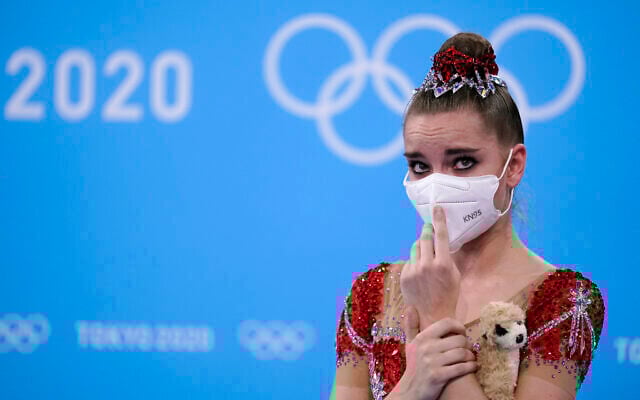 Dina Averina, of the Russian Olympic Committee, waits for her final score after competing in the individual all-around rhythmic gymnastics final at the 2020 Summer Olympics, on Saturday, August 7, 2021, in Tokyo, Japan. Averina won the silver medal in the event. (AP/Ashley Landis) Dina Averina, of the Russian Olympic Committee, waits for her final score after competing in the individual all-around rhythmic gymnastics final at the 2020 Summer Olympics, on Saturday, August 7, 2021, in Tokyo, Japan. Averina won the silver medal in the event. (AP/Ashley Landis)